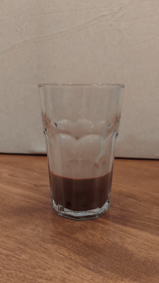 stirring the second soda